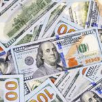 30625064-one-hundred-dollars-new-100-us-dollar-2013-edition-banknotes